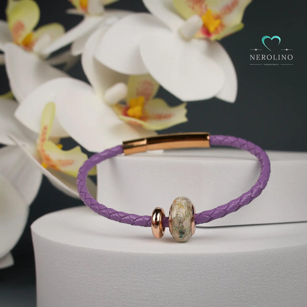 Miniperle mit Asche.