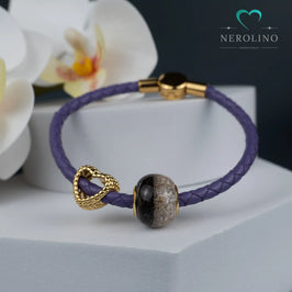 Großlochperle mit Tierhaaren und Asche am Kunstlederarmband.