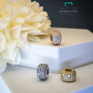 Große Glitzerperle mit Zirkoniabesatz in den Farben Silber, Gold und Roségold.