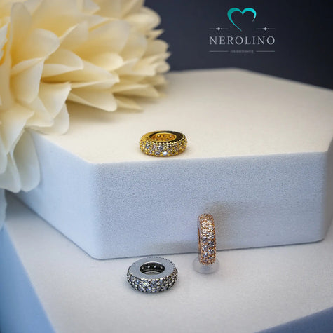 Kleine Perle mit Zirkonia in den Farben Silber, Gold und Roségold.